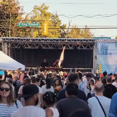 Street festival with live music, DJs, and outdoor market stalls