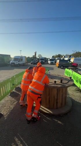 Construction workers gather at Mid Suffolk building site