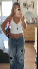 Mirror selfie outfit check in an LA bedroom
