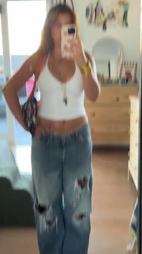 Mirror selfie outfit check in an LA bedroom