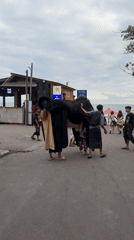 Bali's southwest coast alive at sunset, Barong performance included