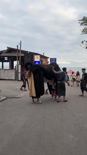 Bali's southwest coast alive at sunset, Barong performance included