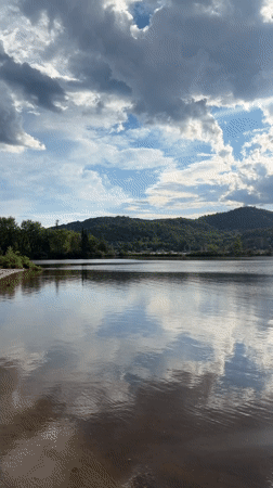 Still lake and carved railing at Mont-Tremblant lookout
