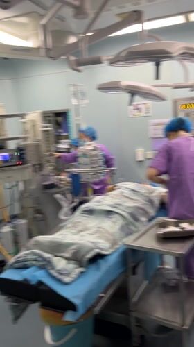 Surgery in progress at Yuzhong District medical facility