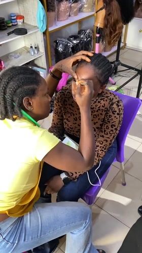 Salon work and street selling in Bukuru, Nigeria