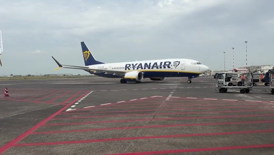 Ryanair passengers disembark at Catania airport