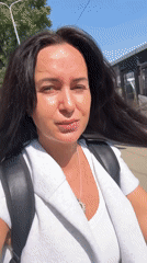 Everyday street life along an Irkutsk sidewalk on a summer afternoon