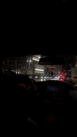 Evening drive captures nighttime Sofia city center scenes
