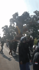 Cultural parade through Sepanyul with costumes, effigies, and traditional dress