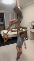 Child exercises and plays indoors in Tomilino residence