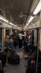Street musicians perform on crowded Moscow subway train