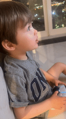 Child plays video games in Moscow area Saturday evening
