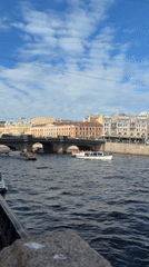 Tourist documents afternoon sightseeing tour through Saint Petersburg canals