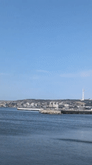 Baku's waterfront and Flame Towers on a clear summer morning