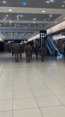 Uniformed group observed in Paris public space
