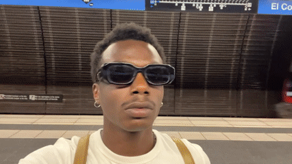 Pausing on a Barcelona metro platform as a train rolls through