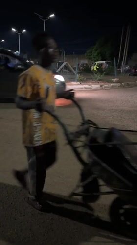 Nighttime street market activity recorded in Bukuru, Nigeria