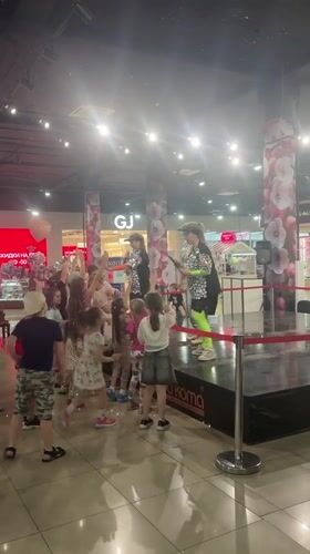 Children imitate dancers at mall performance in Astrakhan