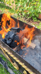 Backyard grill burning in a rural Belarusian yard