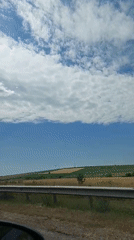 Cruising through dry Moldovan countryside on a sunny morning