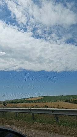 Cruising through dry Moldovan countryside on a sunny morning