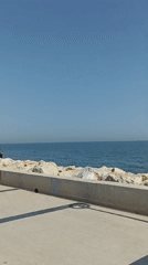 Sunny afternoon scenes captured along Yenişehir coastal promenade
