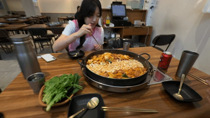Woman dines at Seoul restaurant in early morning hours