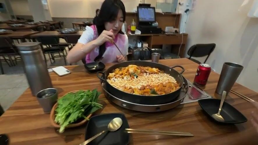 Woman dines at Seoul restaurant in early morning hours