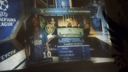 Football match projected indoors in Jos, Nigeria