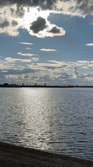 Dramatic skies and sunlight captured over Chaikovsky waterway