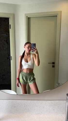 Woman takes mirror selfies in Choeng Thale bathroom