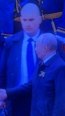 Putin appears in Samara with uniformed officials