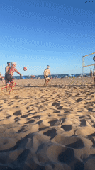 Beach volleyball game on a sunny Tarragona shore