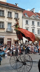 Street parade with floats and performers draws crowds in Warsaw