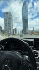 Driver navigates Mercedes through Warsaw streets in morning commute