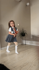 Children photographed in various outfits indoors in Varna