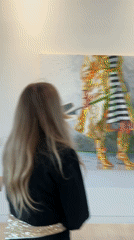 Gallery visitors tour modern art space in West Hollywood