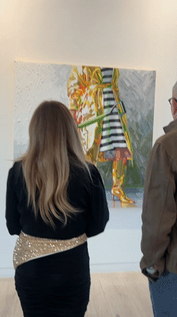 Gallery visitors tour modern art space in West Hollywood