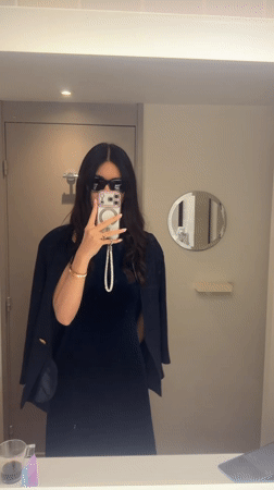 Woman documents hotel stay with bathroom selfies in French Riviera