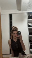 Young women take mirror selfies in Kragujevac apartment