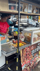 Morning street activity captured in บ้านบางรักษ์, Thailand