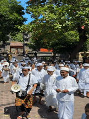 White-clad procession approaches Balinese temple in Gerokgak