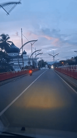 Evening roadside mosque scene captured in Baro, Indonesia
