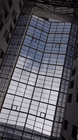 Afternoon inside a grand Saint Petersburg building with a glass atrium