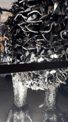 Dubai outdoor exhibit showcases massive scrap-metal sculptures at night