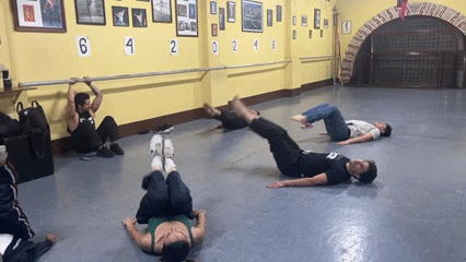 Early morning group workout session in decorated dance studio