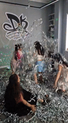 Kids' creative studio event with confetti, crafts, and color