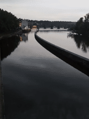 Evening riverfront activity documented across central Prague