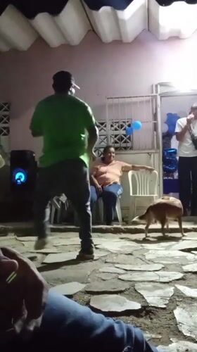 Man dances on stone pavement in Venezuelan town