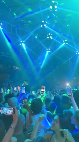 Packed club night in Varna, crowd and performer in full swing